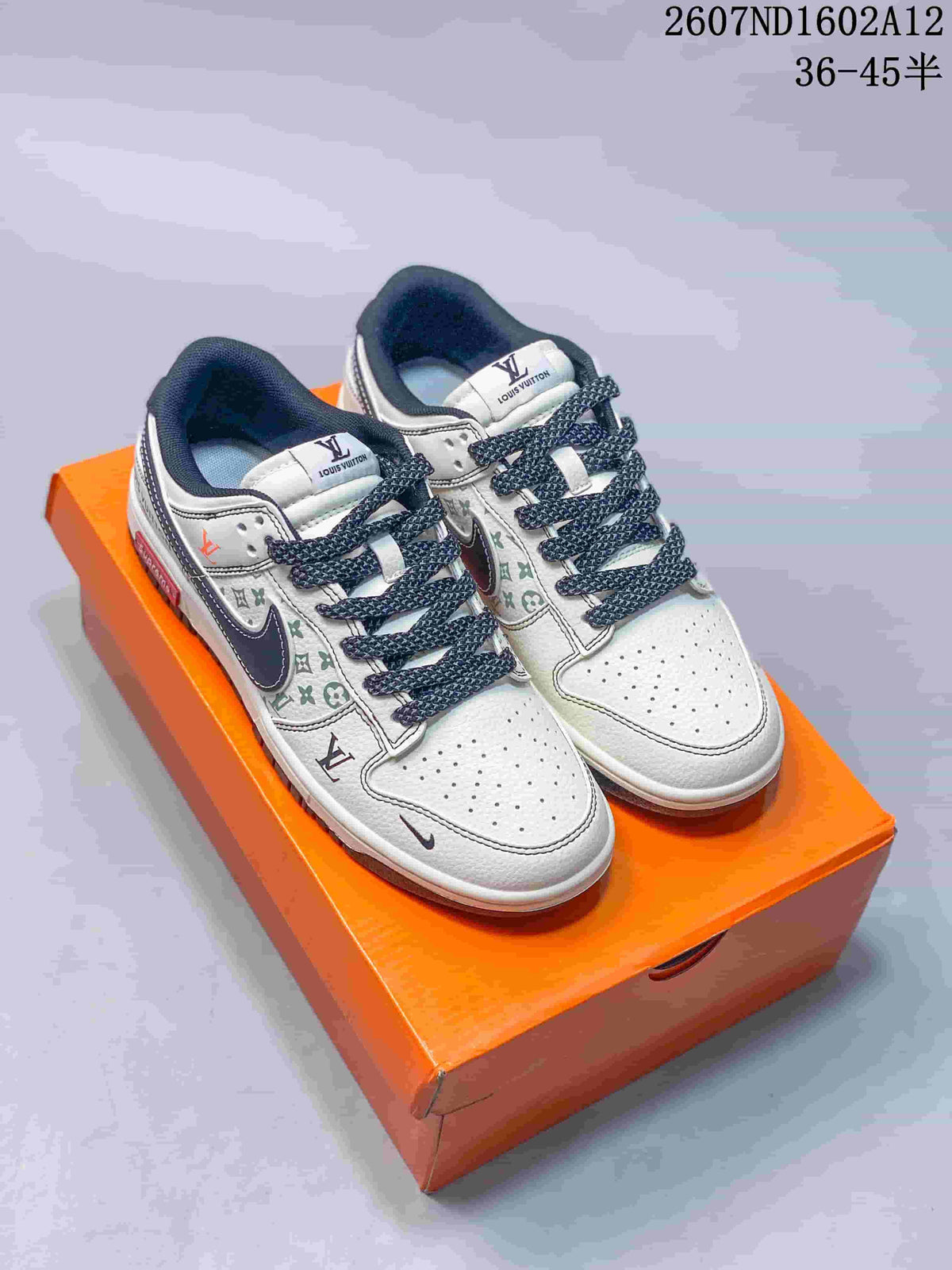 Nike SB Dunk Low Trainers White Black Red Style 2607ND1602A12 - product image from the listing.