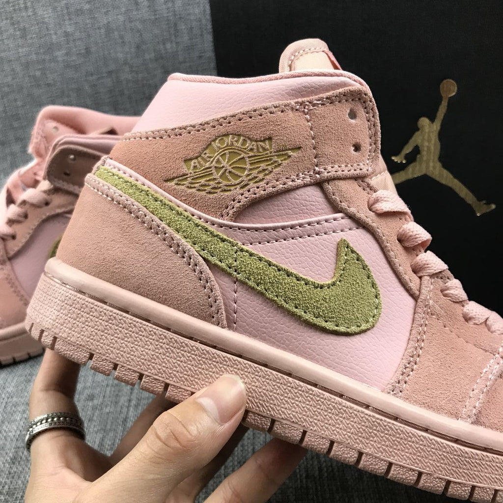 Jordan 1 Mid SE Sneakers in Pink 852542-600 - product image from the listing.