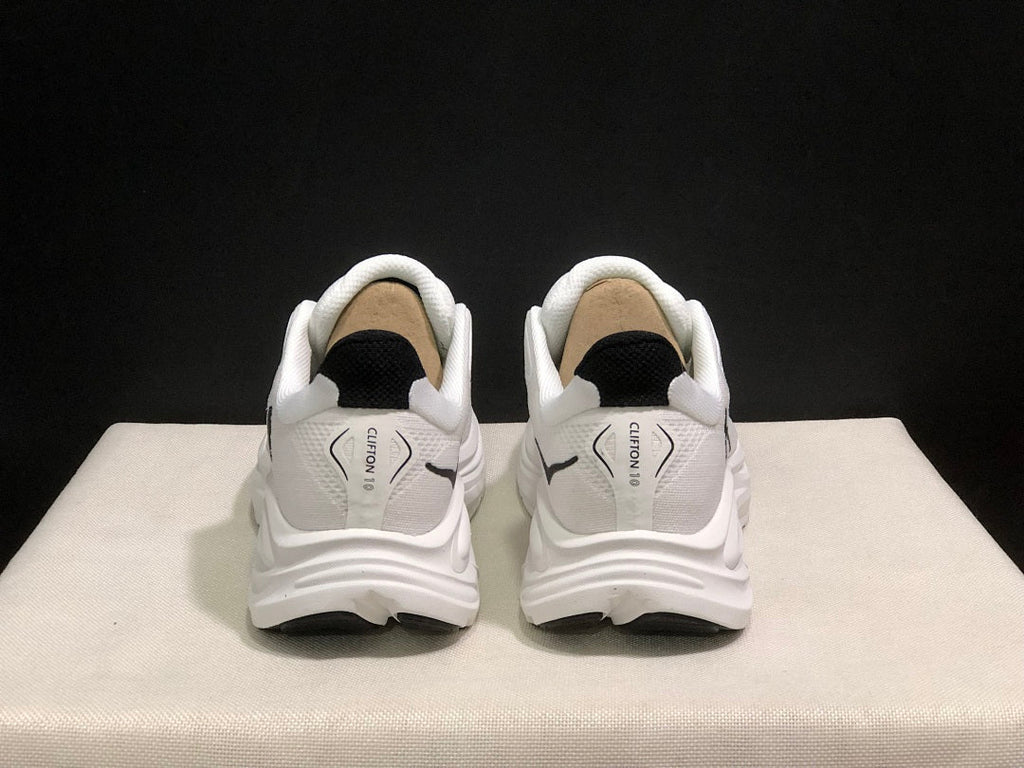 HOKA Clifton 10 Running Shoes in White - product image from the listing.
