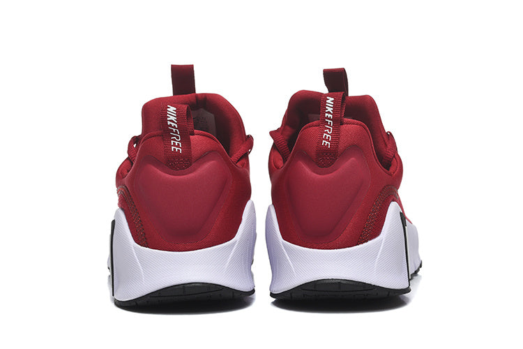 Nike Free Low-Top Sneakers in Red - product image from the listing.
