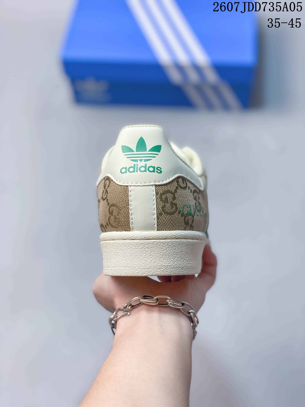 adidas Superstar Trainers Beige Green Shell-Toe Style 2607JDD735A05 - product image from the listing.