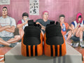 Basketball Sneakers in Black and Orange - product image from the listing.