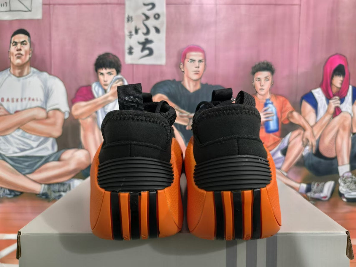 Basketball Sneakers in Black and Orange - product image from the listing.