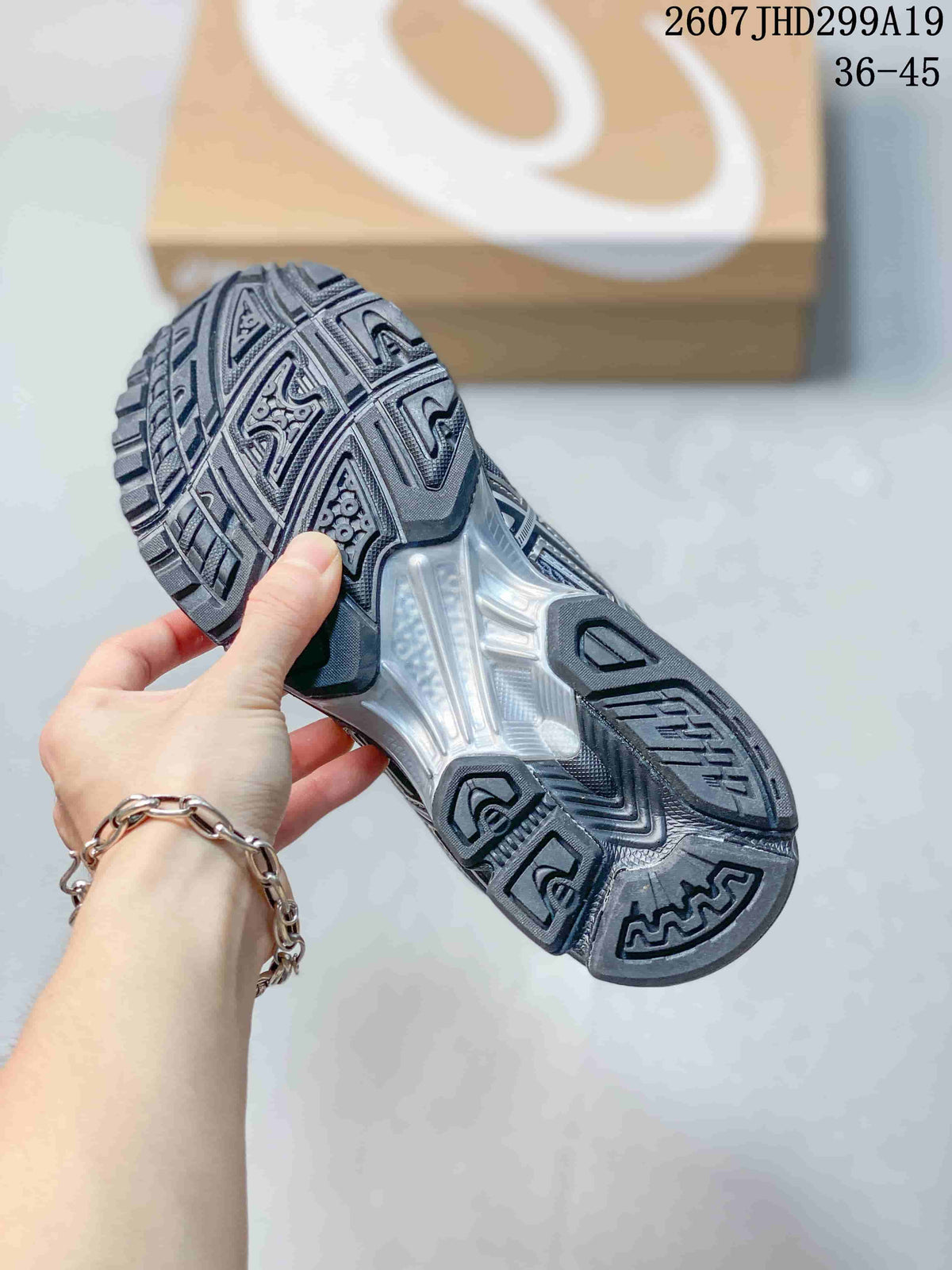 ASICS Gel-Nimbus 10.1 Sneakers in Black Silver 2607JHD299A19 - product image from the listing.