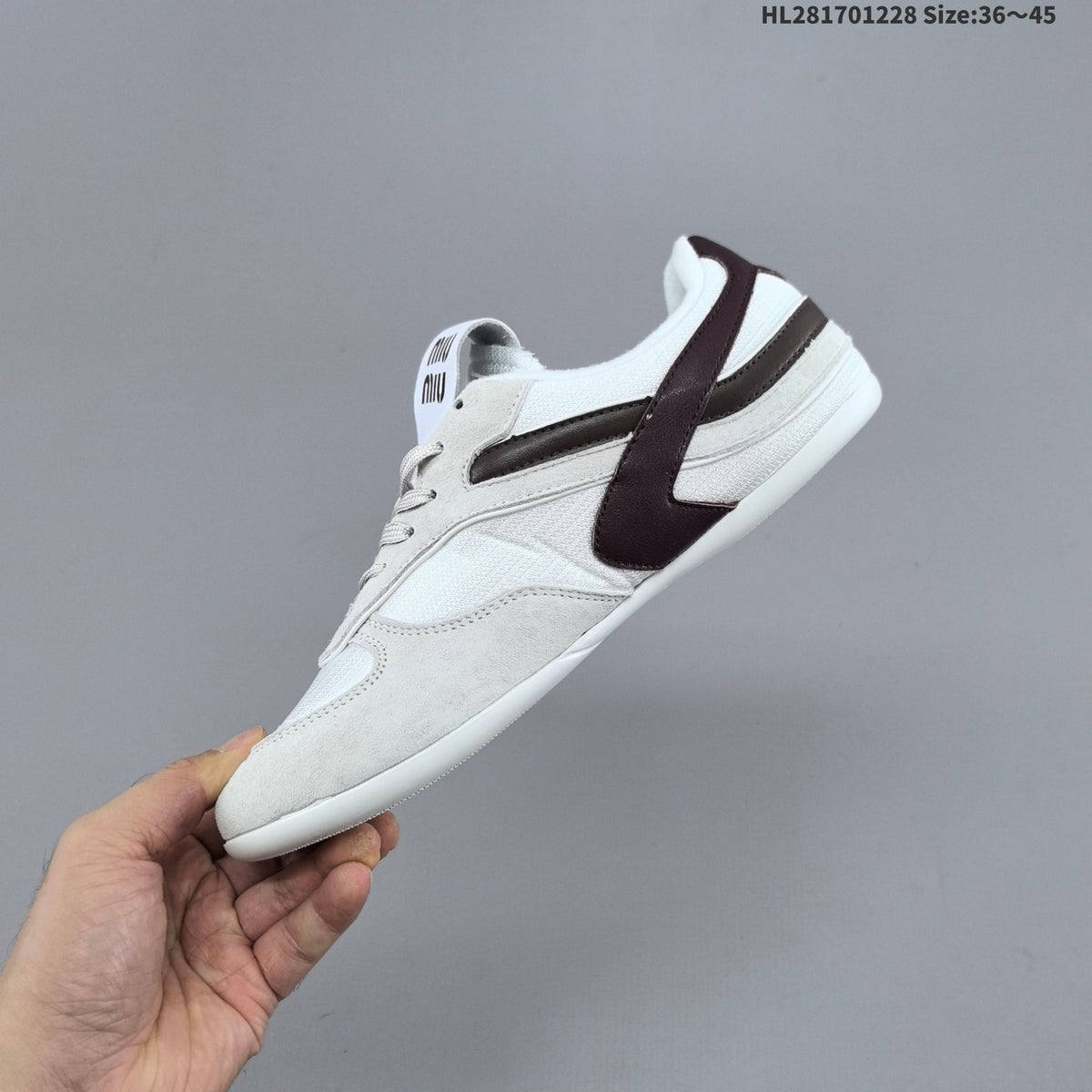 Women's Miu Miu White and Gray Lace-Up Sneakers - product image from the listing.