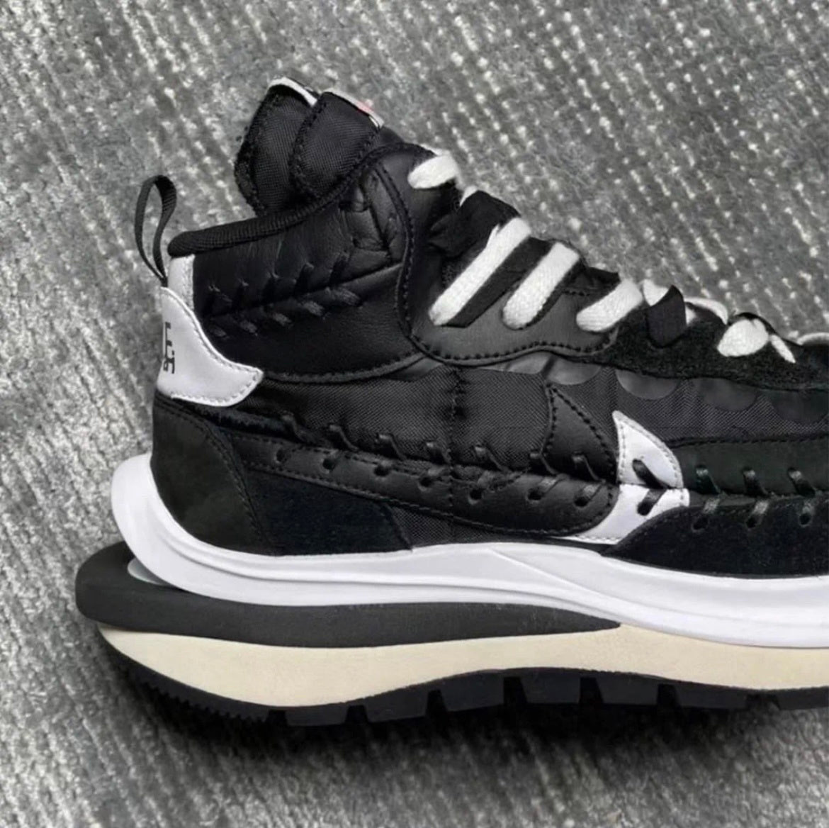 Nike VaporWaffle DH9186-001 Sneakers in Black and White - product image from the listing.