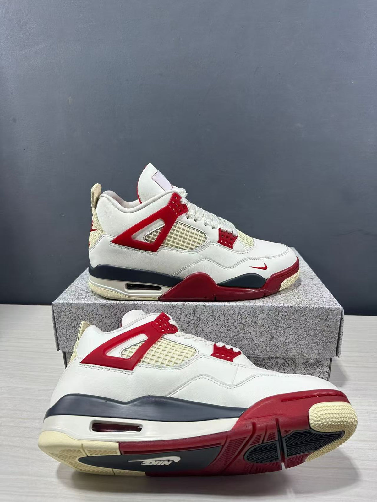 Air Jordan 4 Retro White Red Sneakers - product image from the listing.