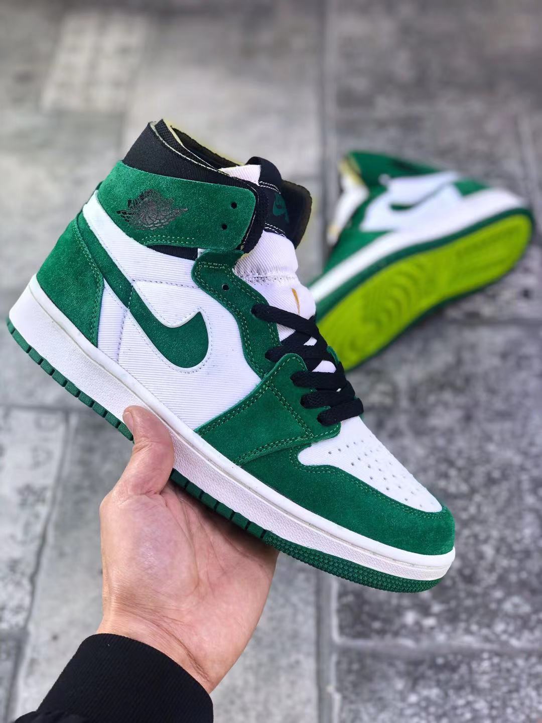 Jordan 1 Zoom CMFT Sneakers in Green White CT0978-300 - product image from the listing.