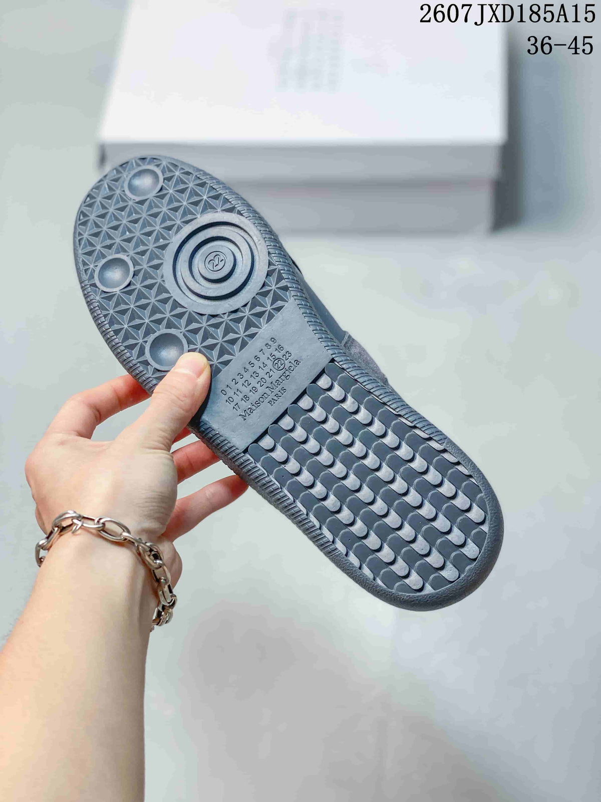 Maison Margiela S57WS0236 Low-Top Sneakers in Gray - product image from the listing.