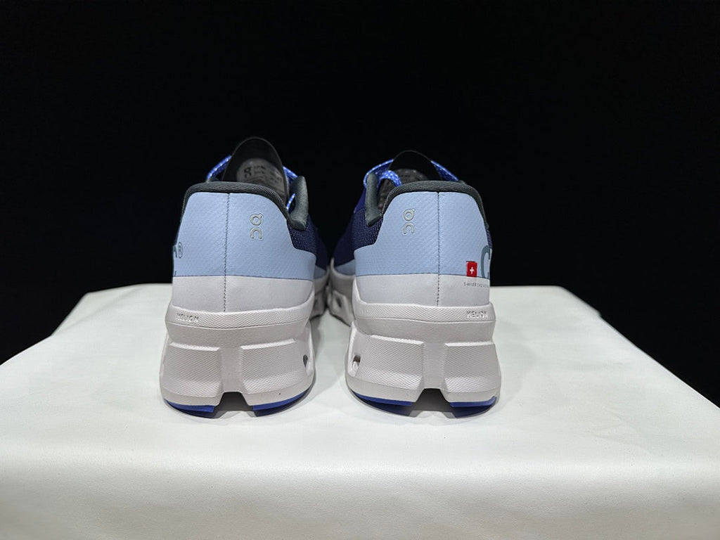 On Cloudmonster Running Shoes, in Navy and White - product image from the listing.