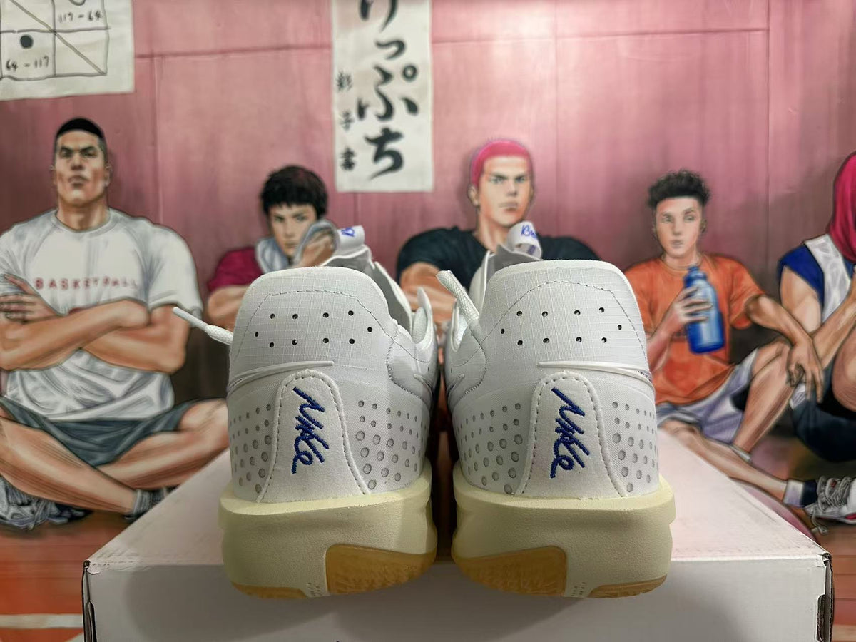 Nike ZoomX Basketball Sneakers in White Blue Orange - product image from the listing.