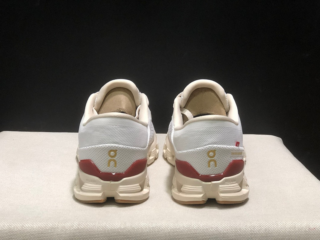 On Cloud X 4 Year of the Snake Sneakers in Ivory Cream - product image from the listing.