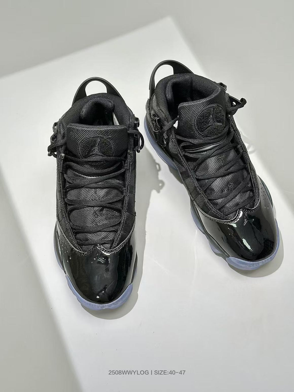 Jordan 6-4 High-Top Sneakers in Black - product image from the listing.
