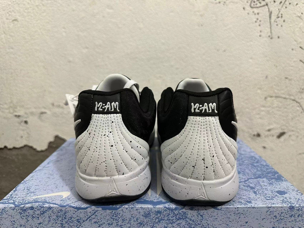 Nike Kobe 5 Protro Basketball Shoes in Black White - product image from the listing.