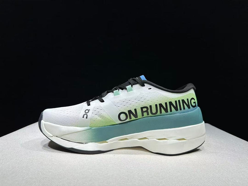 On Cloudboom Max Running Shoes, in White and Green - product image from the listing.