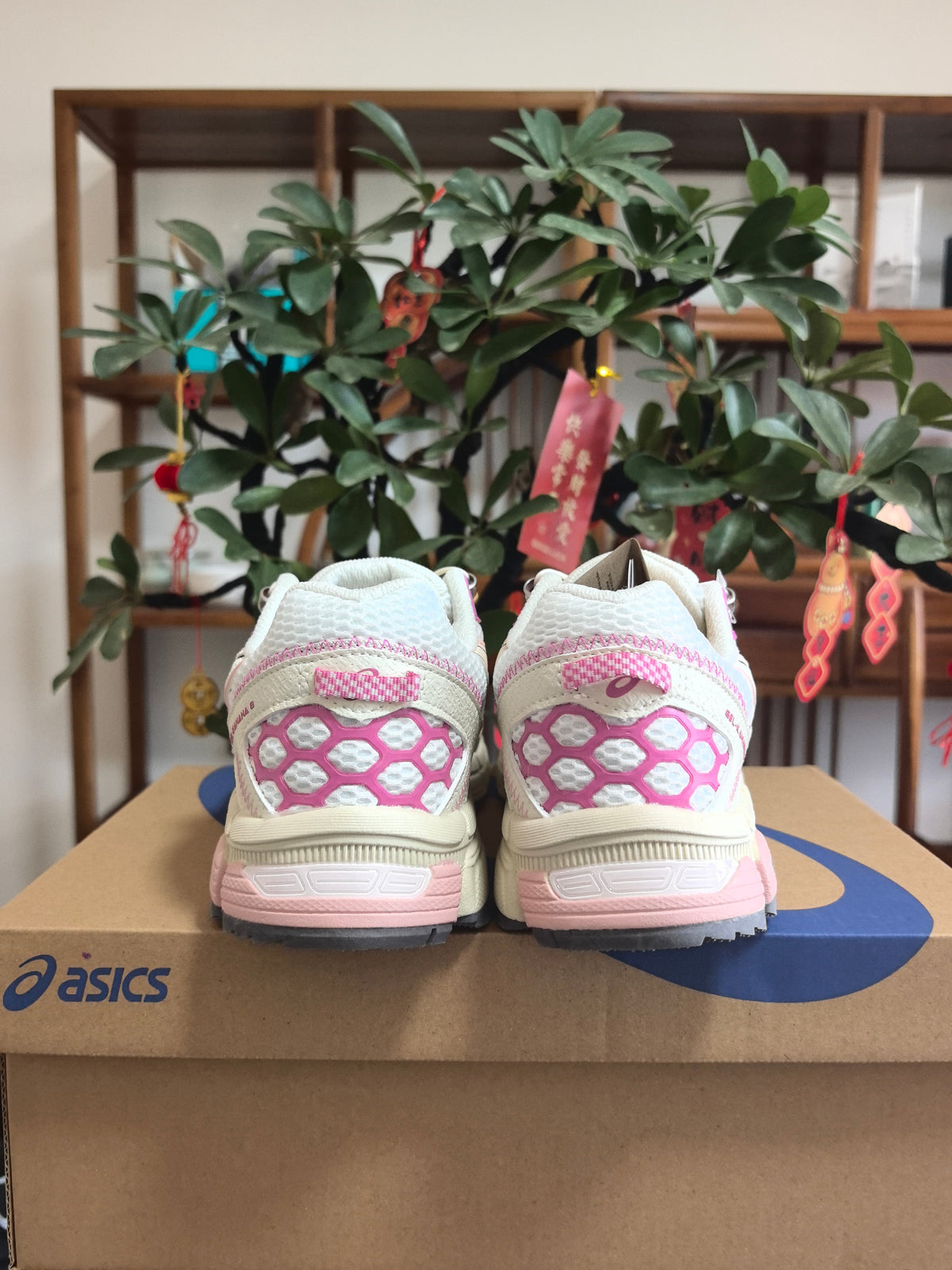 Pink and White ASICS KL1 Sneakers - product image from the listing.