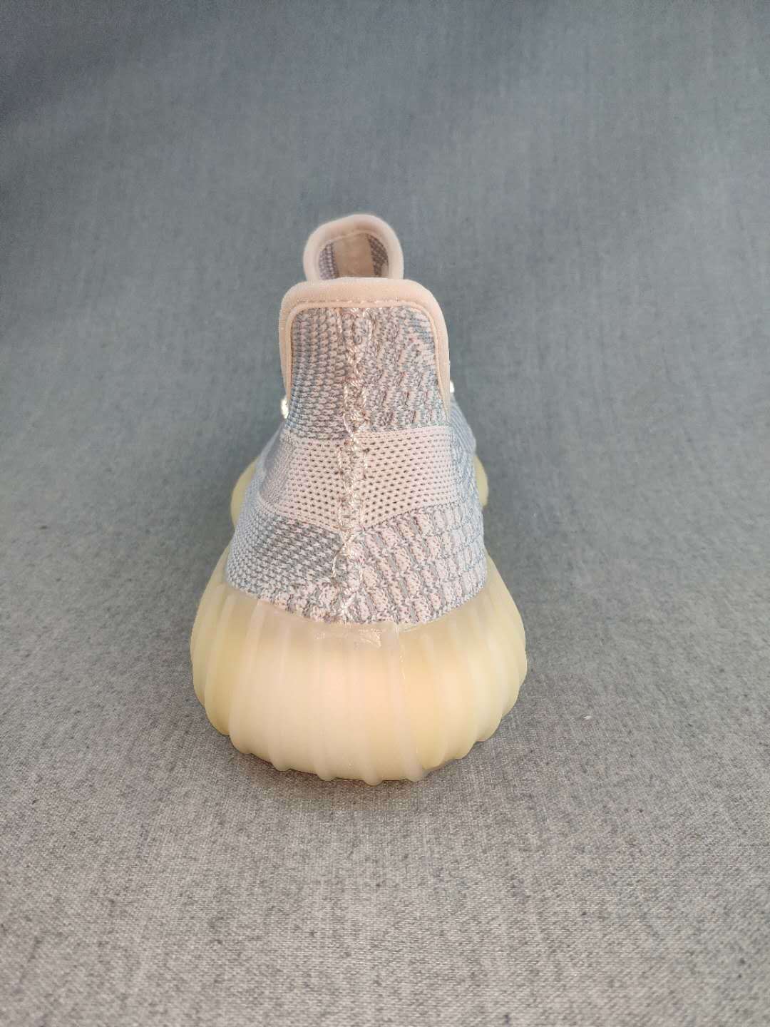 Gray and Cream Yeezy 350 V2 Knit Sneakers - product image from the listing.
