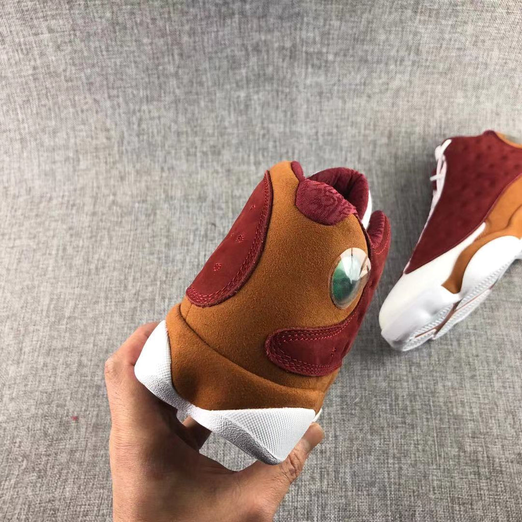 Air Jordan 13 Bin 23 Sneakers Burgundy Brown 417212-601 - product image from the listing.