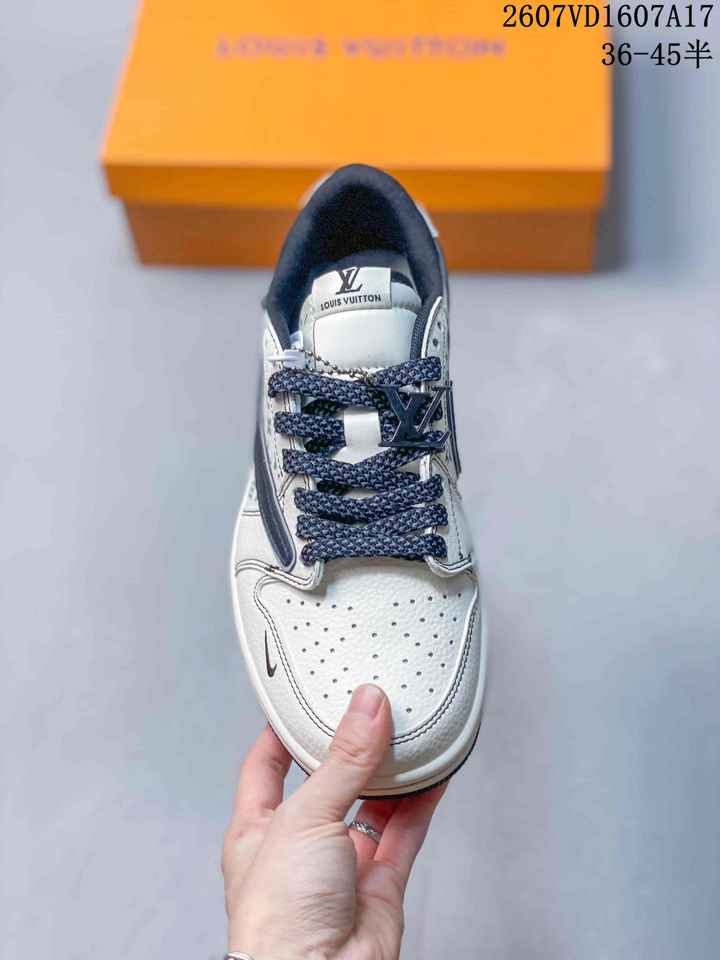 White Navy Monogram Sneakers - Jordan 1 Low - product image from the listing.