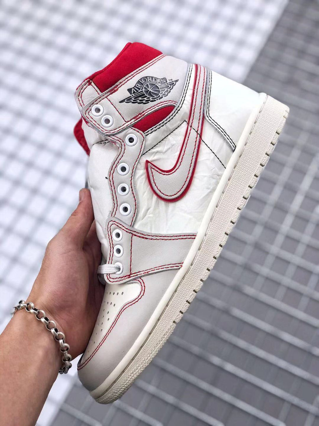 Air Jordan 1 Retro High OG Sneakers in White and Red - product image from the listing.
