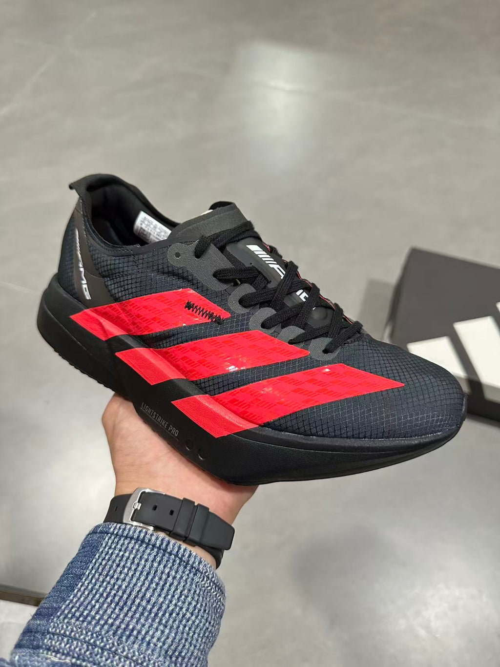 Adidas Lightstrike Pro Running Shoes in Black Red KH8840 - product image from the listing.
