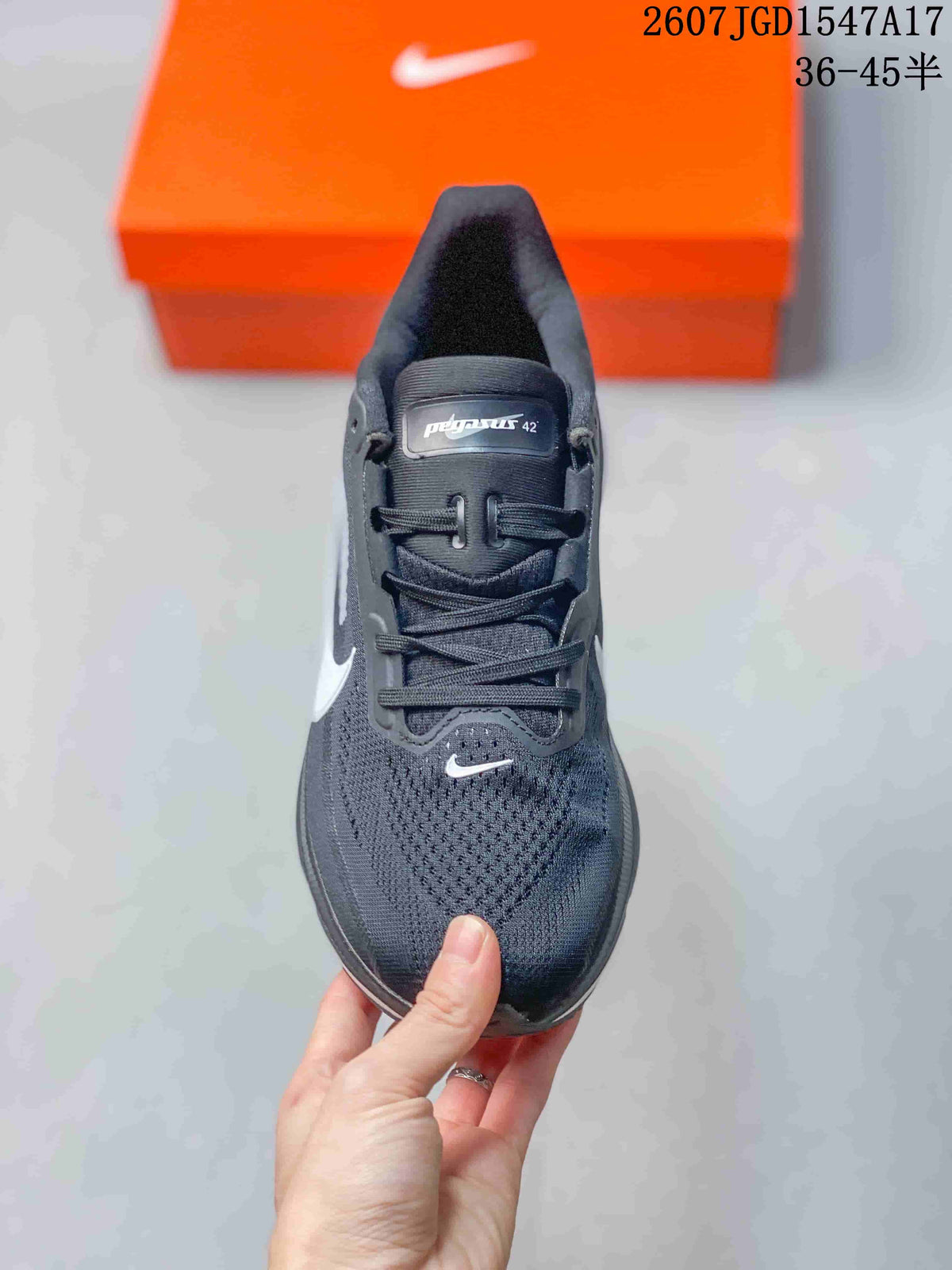 Nike Air Zoom Pegasus 42 Running Sneakers in Black White - product image from the listing.