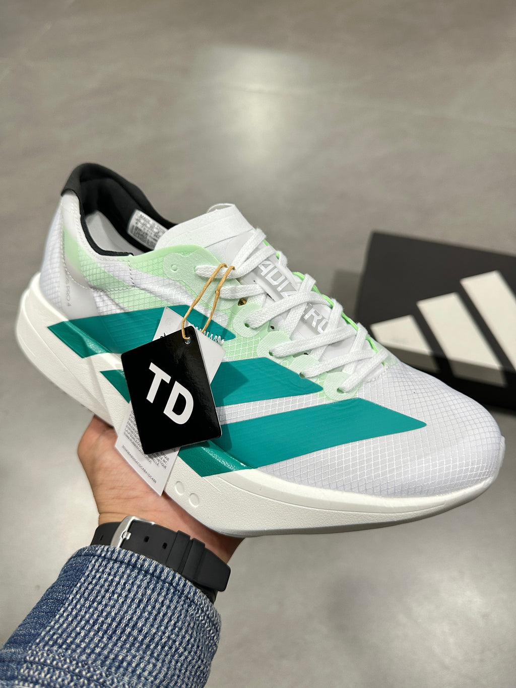 Adidas Adizero Lightstrike Pro Running Shoes in White Teal - product image from the listing.