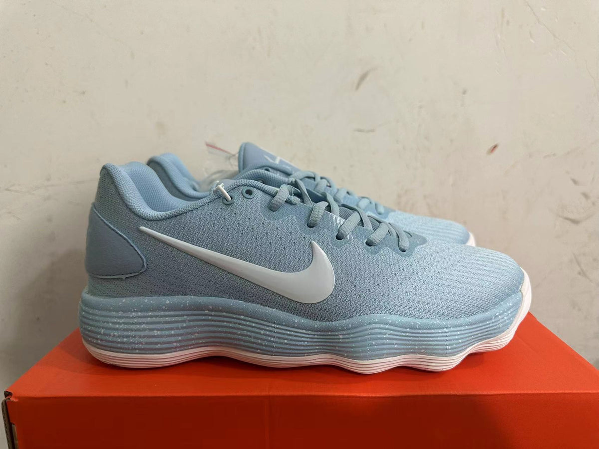 Nike Basketball Footwear in Blue with White Swoosh - product image from the listing.