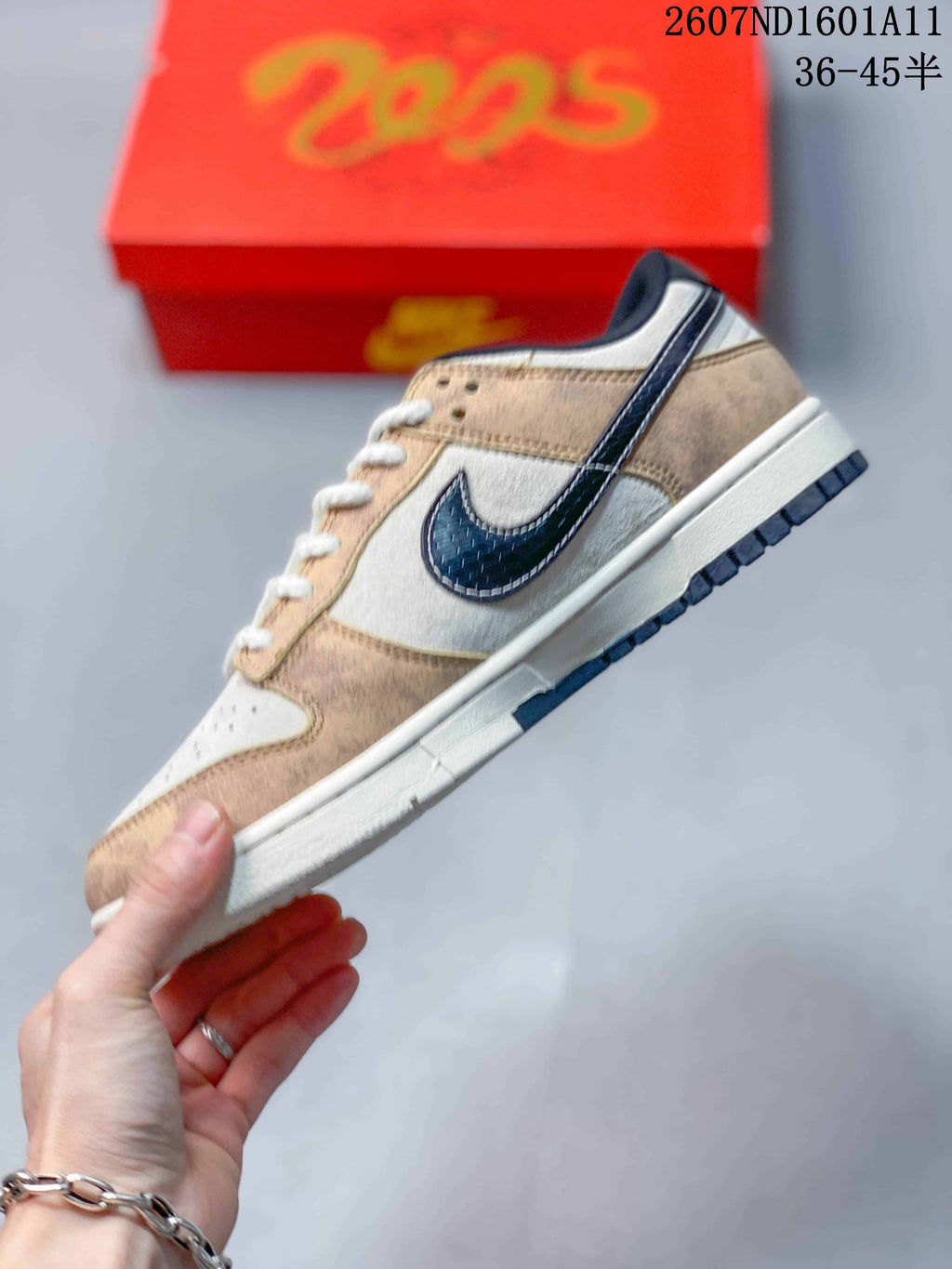 Nike SB Dunk Low Sneakers in Off-White Tan White Navy - product image from the listing.