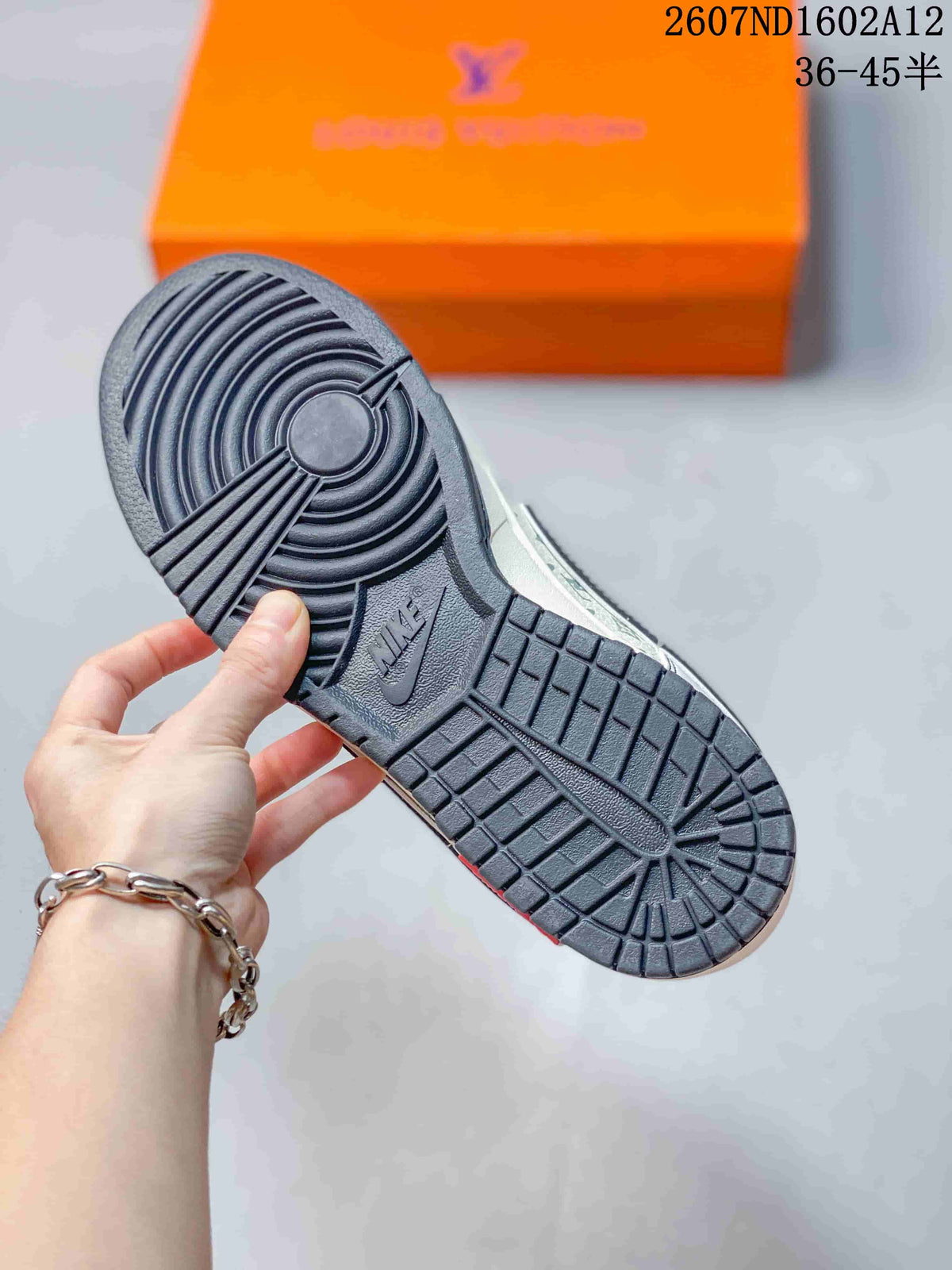Nike SB Dunk Low Trainers White Black Red Style 2607ND1602A12 - product image from the listing.