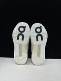 Cream and Black On The Roger Advantage Pro Sneakers - product image from the listing.