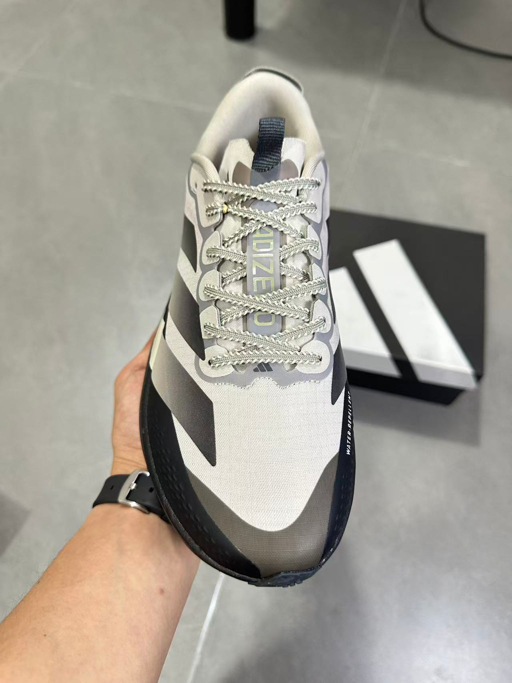 Adizero SL ATR Running Shoes in Black Brown KK0309 - product image from the listing.