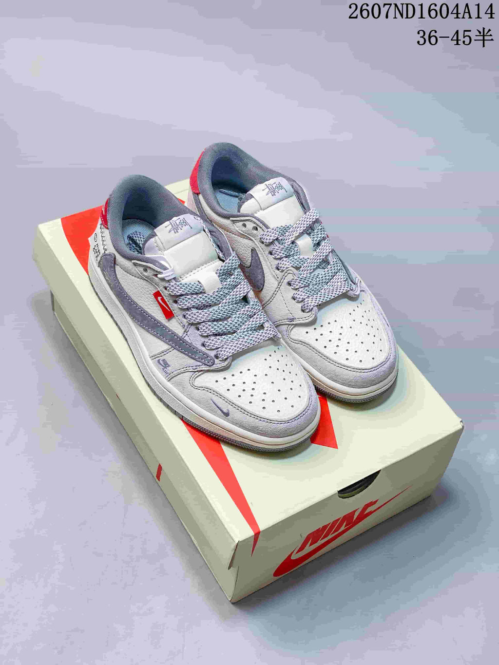 Nike SB Dunk Low Sneakers in Gray and Off-White 2607ND1604A14 - product image from the listing.