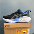 ASICS Novablast 5 LE Running Shoes in Black Blue - product image from the listing.
