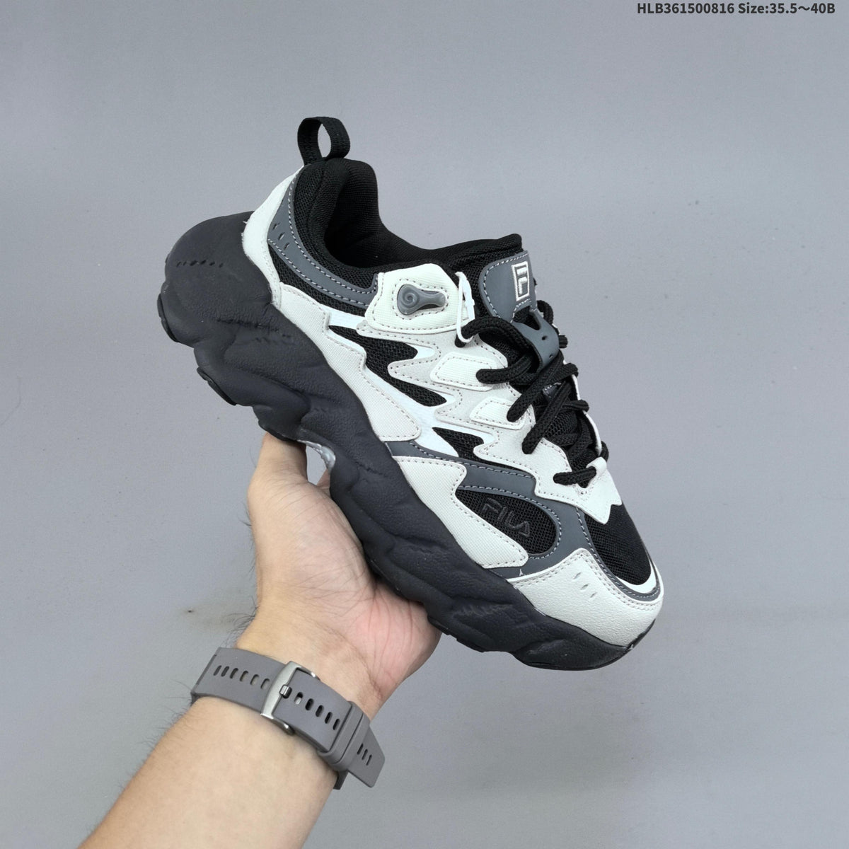 FILA Chunky Low-Top Sneakers in Cream or in Black - product image from the listing.