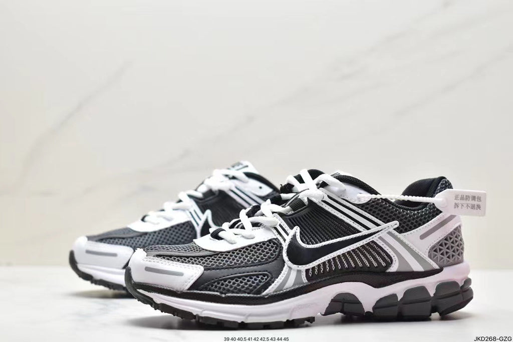 Nike Air More Uptempo Sneakers in Black and White - product image from the listing.