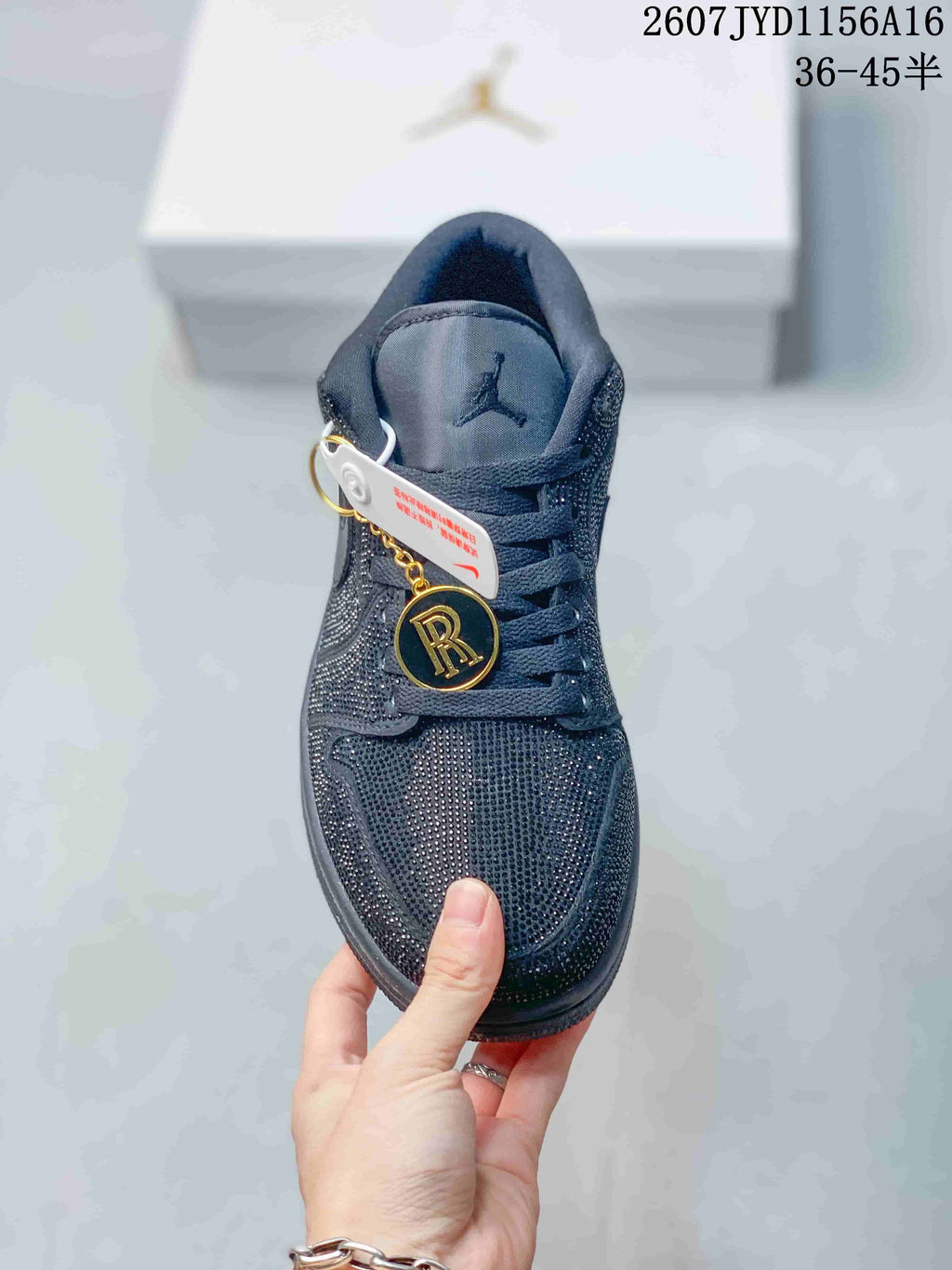 Air Jordan 1 Black Embellished Low-Top Sneakers - product image from the listing.