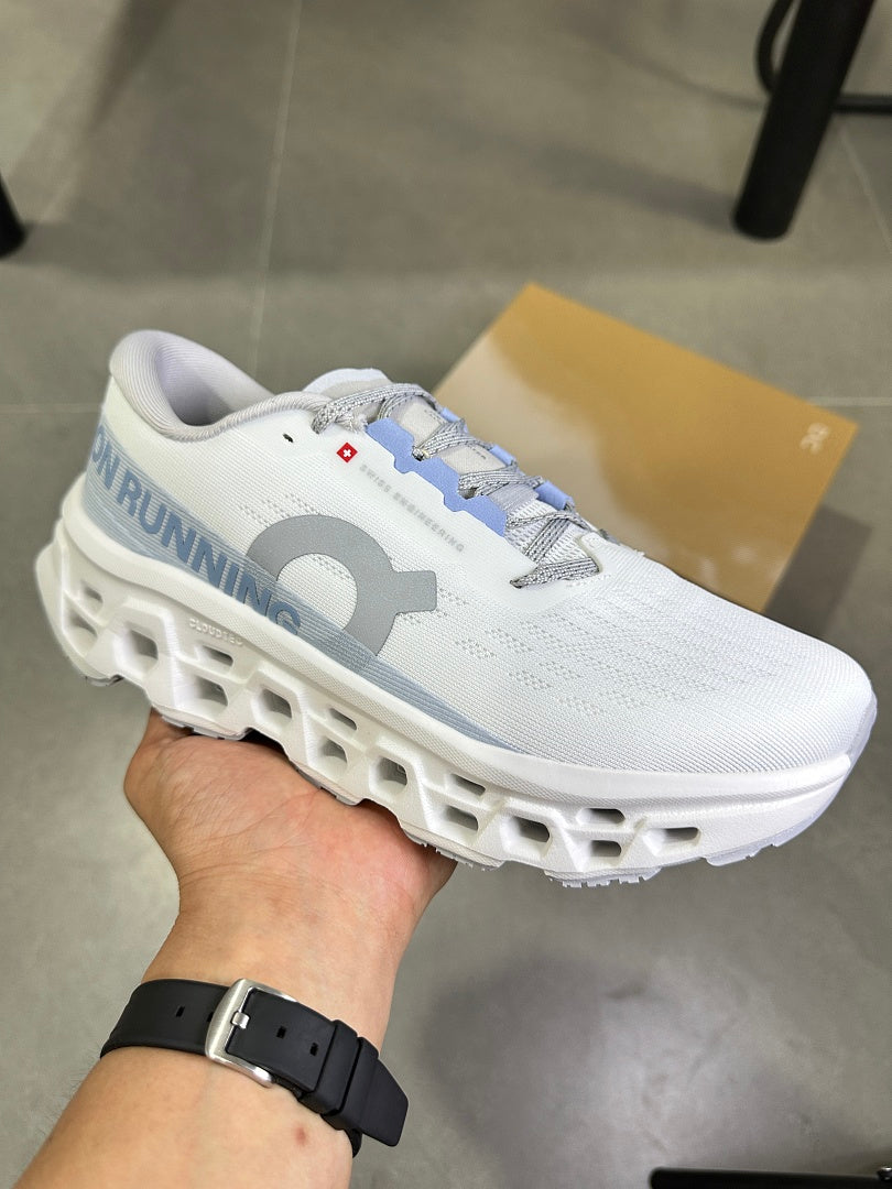 On Running Cloudsurfer Next Running Shoes in White Blue - product image from the listing.