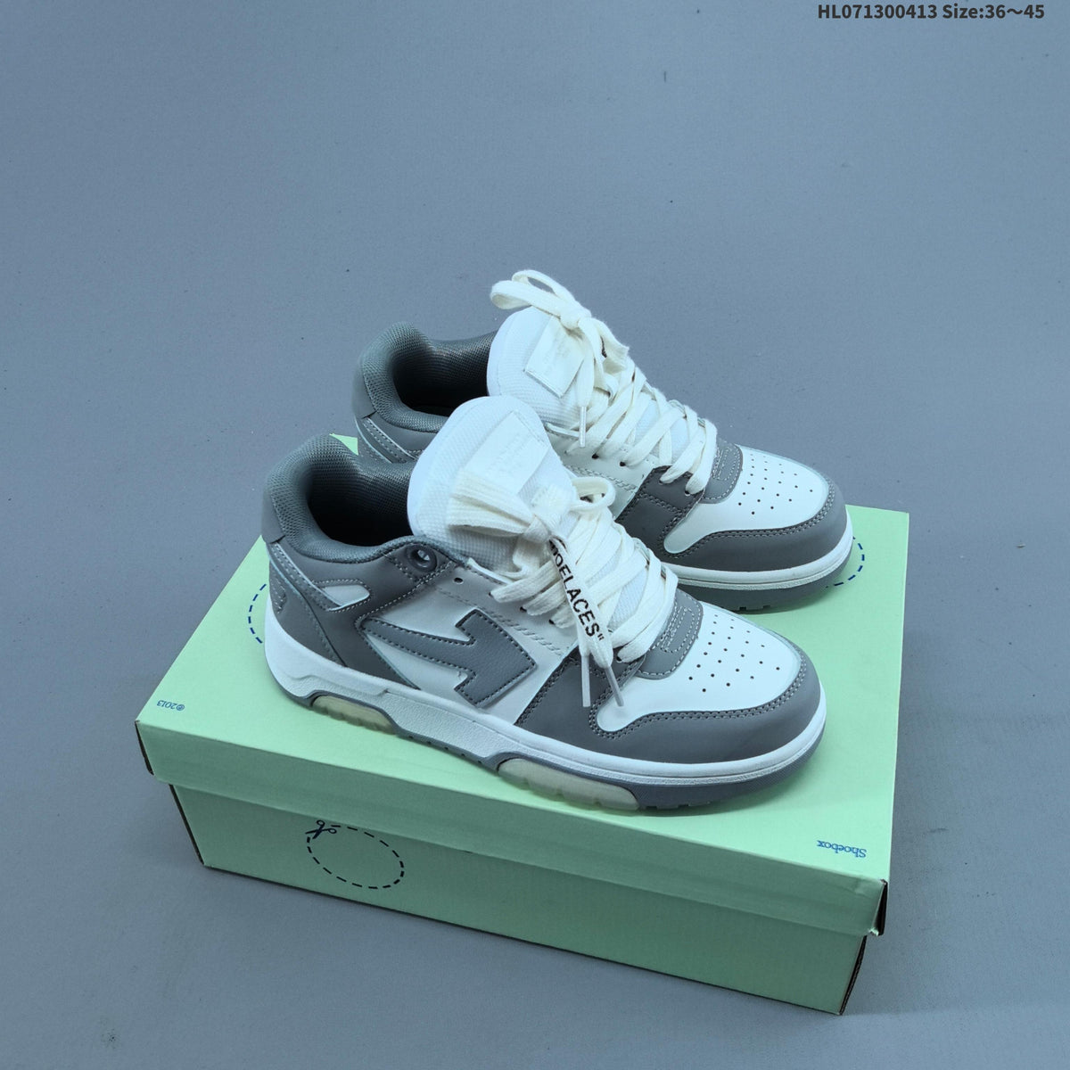 White and Grey Off-White Arrows Low-Top Sneakers - product image from the listing.