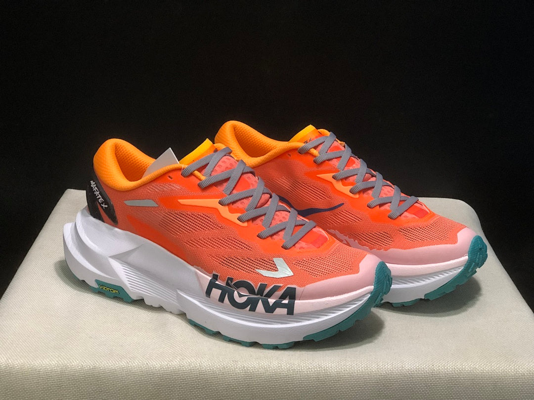 Orange HOKA Mafate X Trail Running Shoes - product image from the listing.