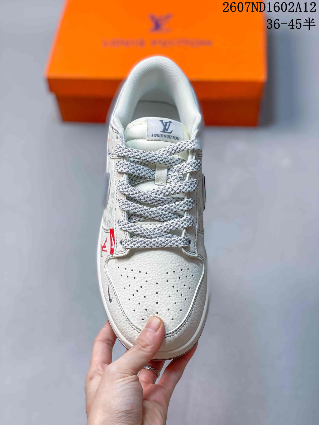 Nike SB Dunk Low Sneakers in White Gray Red 2607ND1602A12 - product image from the listing.