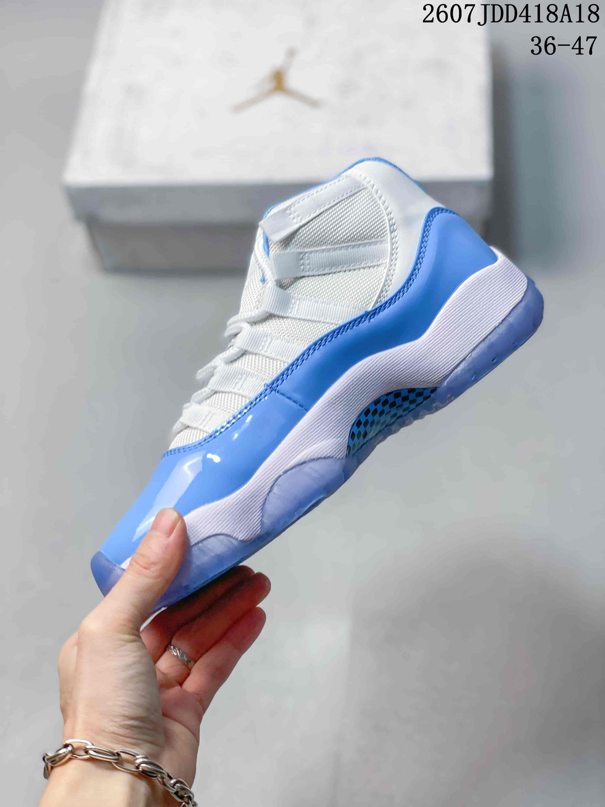 Air Jordan 11 Retro High-Top Sneakers Blue and White - product image from the listing.