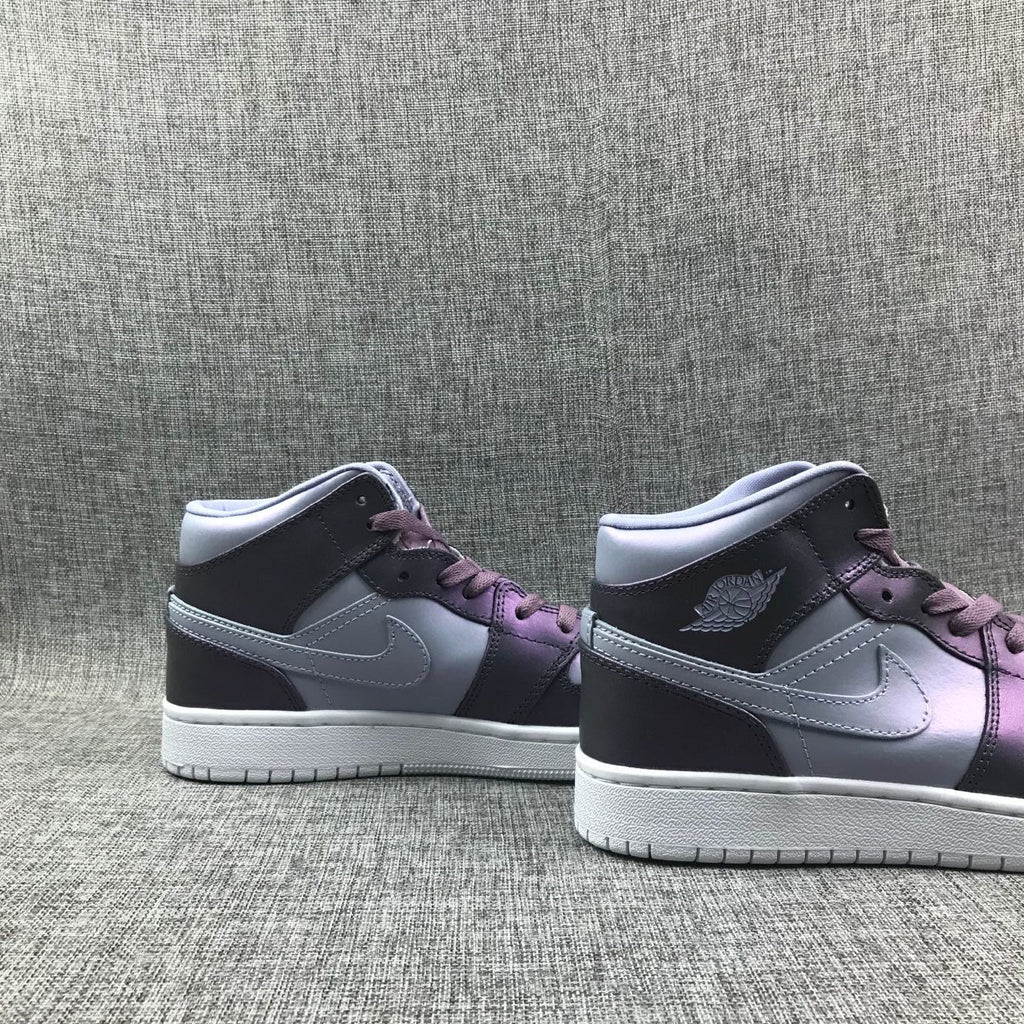 Jordan 1 Mid Sneakers in Purple AV5174-400 - product image from the listing.