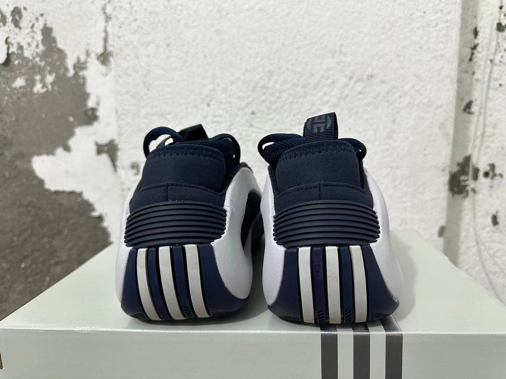 Navy and White Adidas Basketball Shoes - product image from the listing.