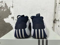 Navy and White Adidas Basketball Shoes - product image from the listing.