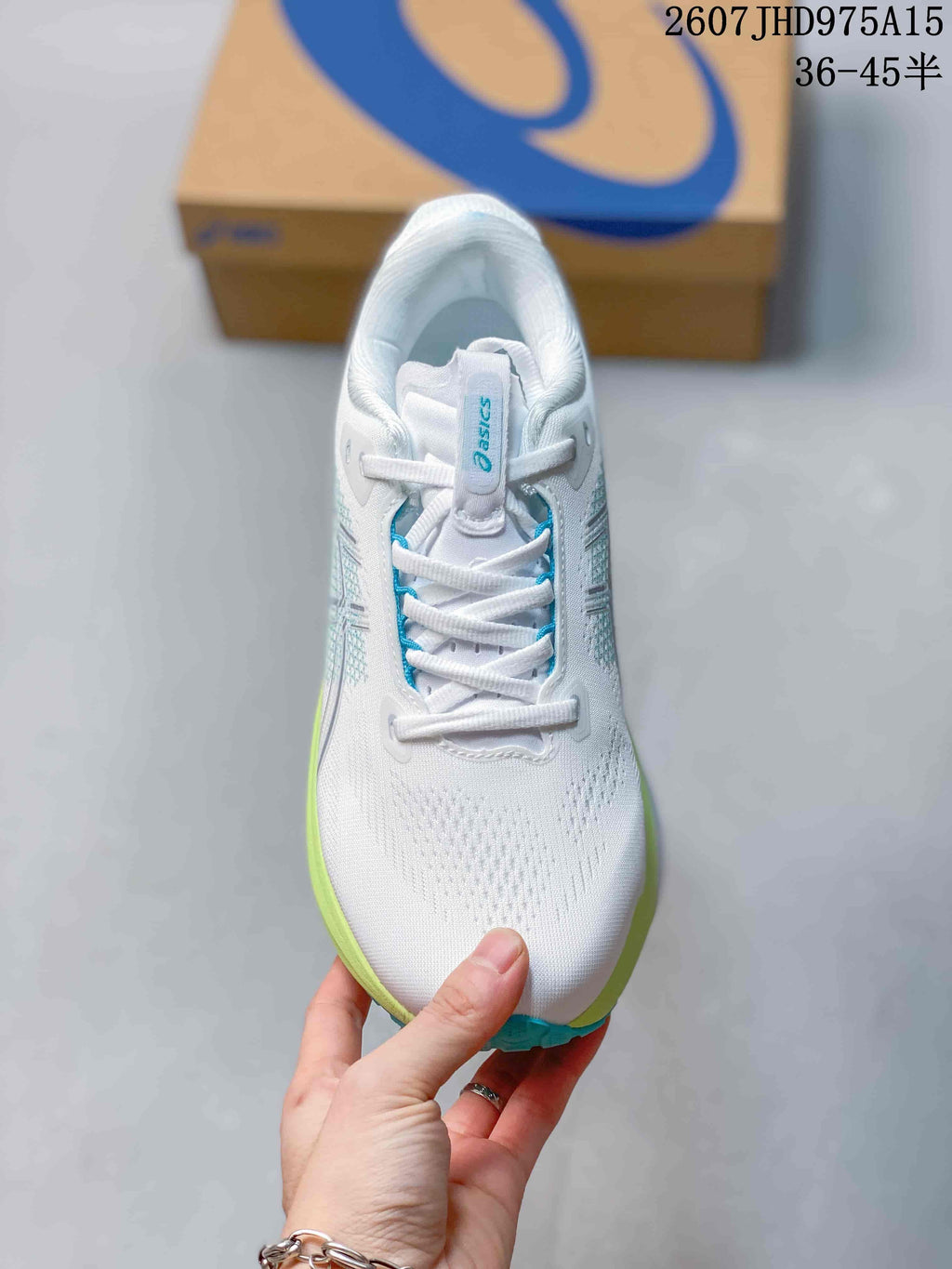 ASICS Gel-Kayano 33 Running Shoes in White Lime Blue 1011C167-402 - product image from the listing.