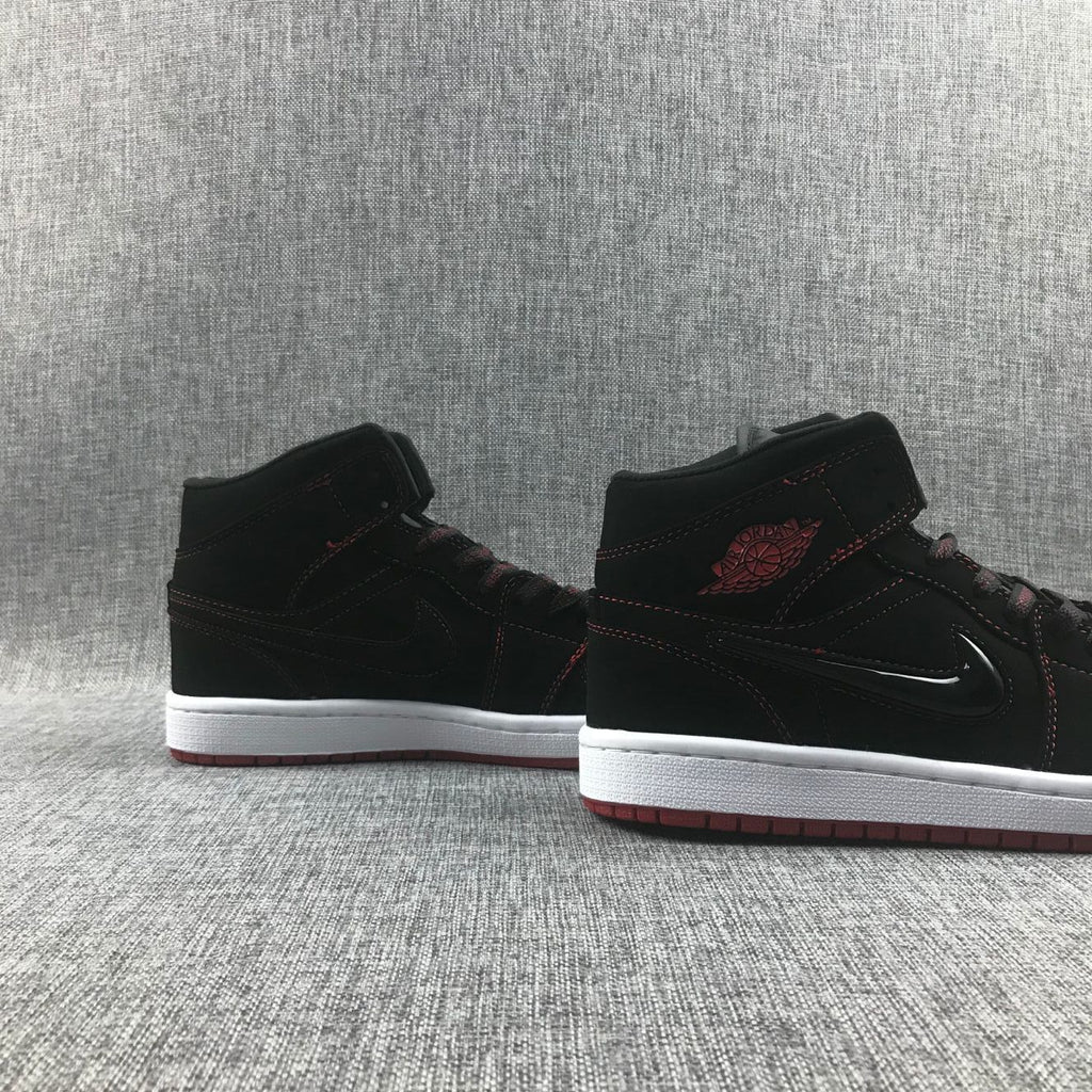 Air Jordan 1 Mid Sneakers Black Red CK5665-062 - product image from the listing.