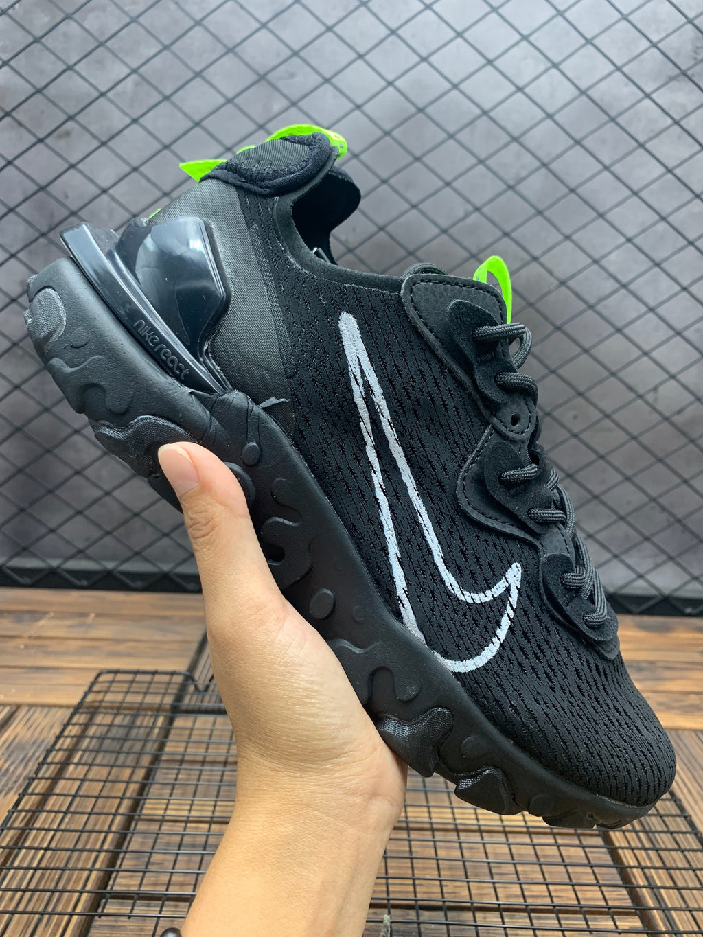 Nike React Live Black Trainers with Volt Accents - product image from the listing.