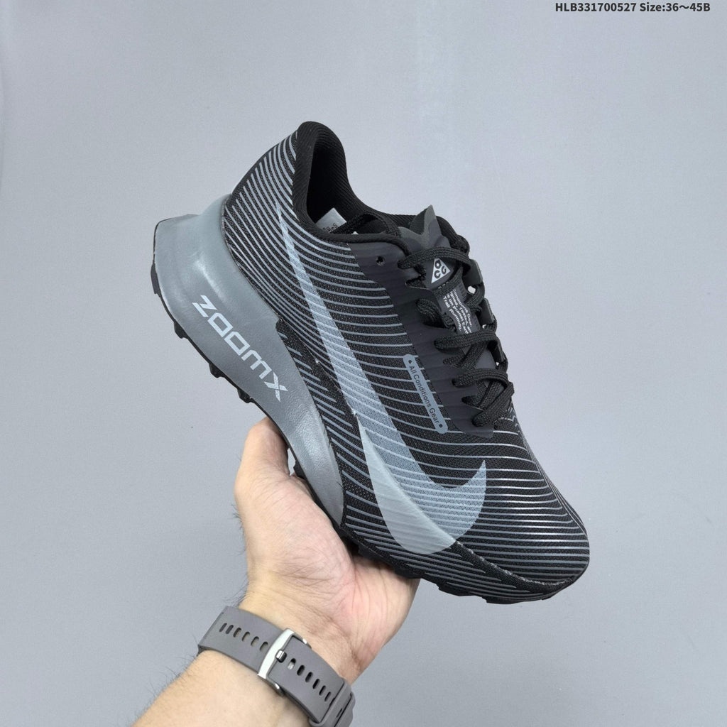 Black and Gray Nike ACG Ultrafly Trail Running Shoes - product image from the listing.