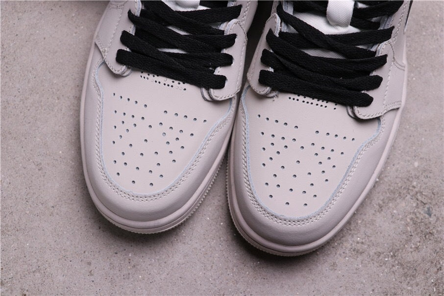 Jordan 1 Zoom CMFT Sneakers in Summit White CT0979-100 - product image from the listing.